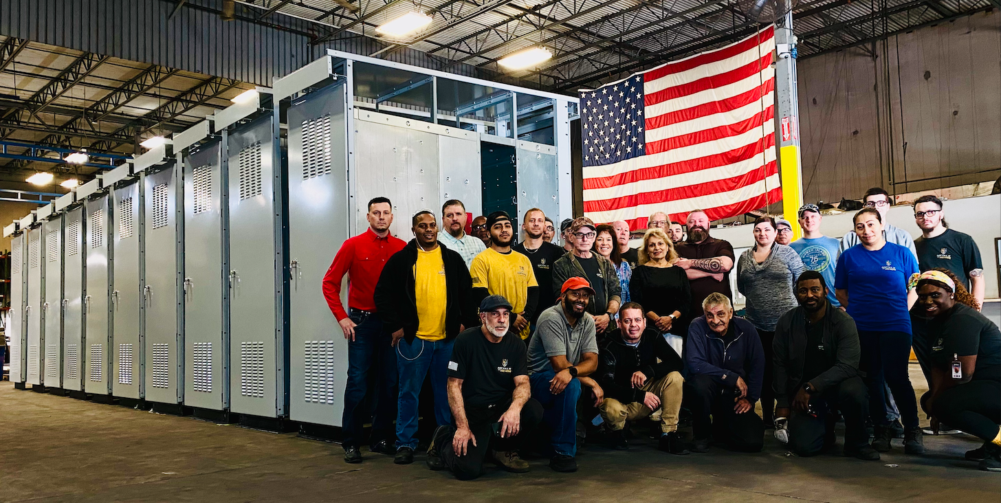 Metals of Honor team gathered on the manufacturing floor